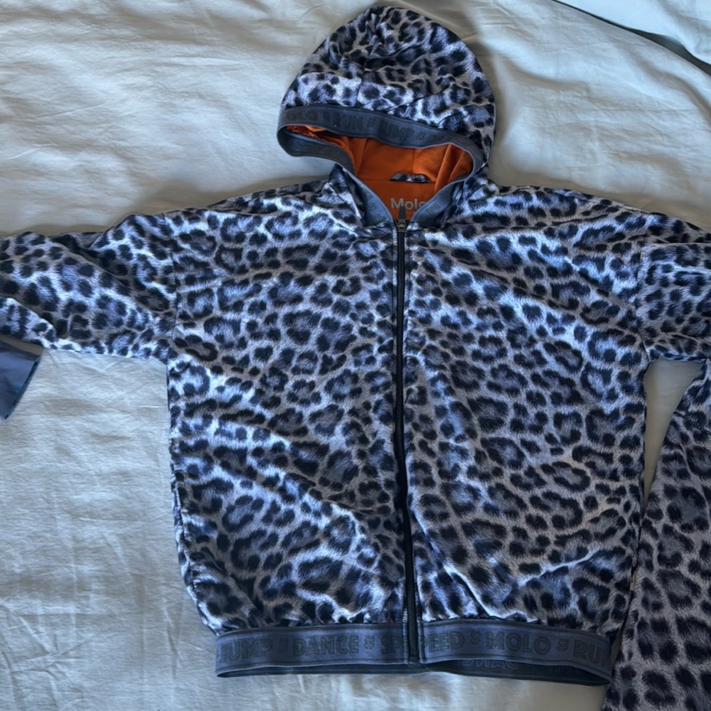 Molo track suit, girls. Pants are a 11-12 and jacket is a 13-14
